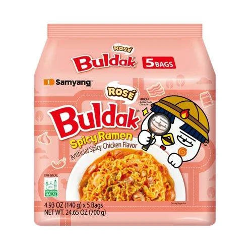 Spicy Samyang Buldak ramen in a bowl with noodles, chili peppers, and seasoning, showcasing the Korean instant ramen brand.