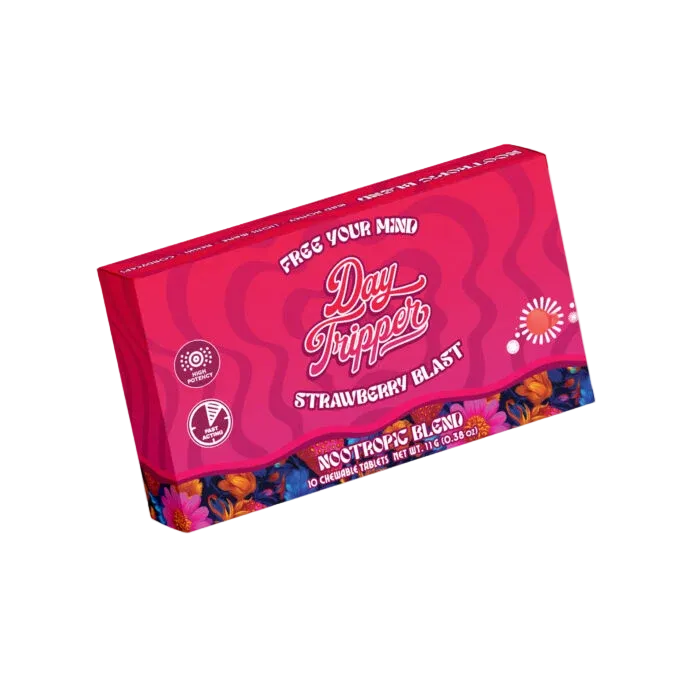 Pink packaging of Day Trippers Strawberry Blast nootropic blend on a white background